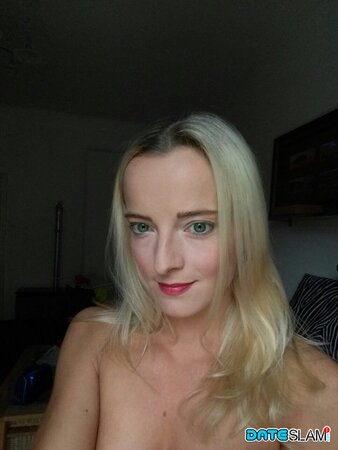 Blonde with a huge forehead showing her amazing tits