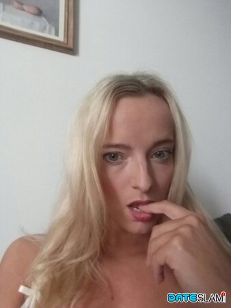 Blonde with a huge forehead showing her amazing tits