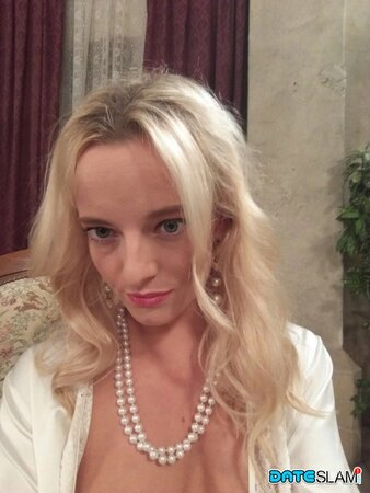Blonde with a huge forehead showing her amazing tits