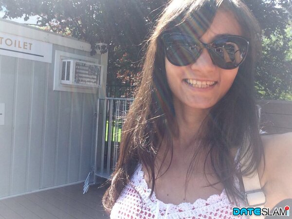 Brunette looks hella cute while showing her tight body