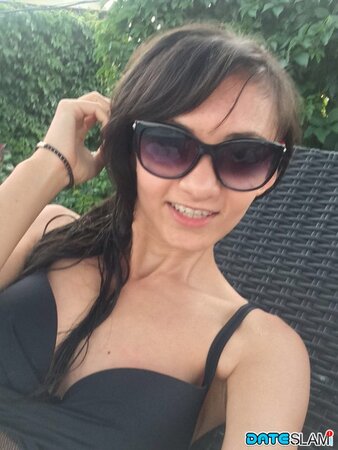 Brunette looks hella cute while showing her tight body