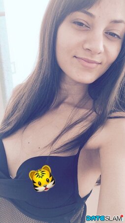 Brunette looks hella cute while showing her tight body