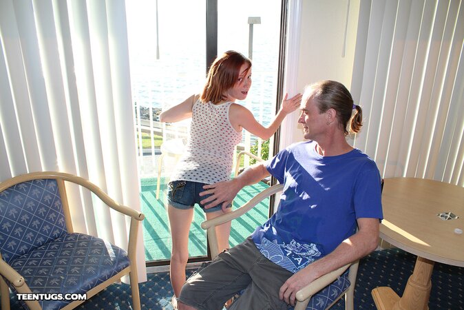 Redheaded babe Alyssa Hart is jerking the guy off happily