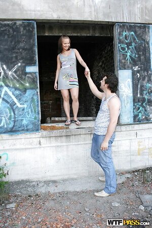 Teen dollface sucked two dicks and fucked by one of them near abandoned building