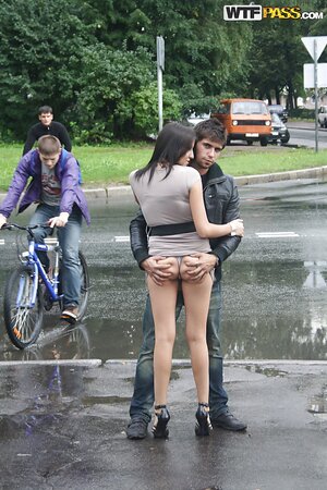 Russian slut flashes tits and lets guy touch her ass in the public place