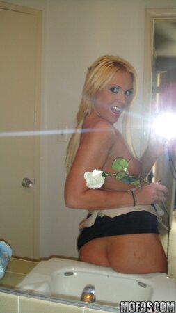 Blonde girl receives a flower from admirer and thanks guy by naked pics