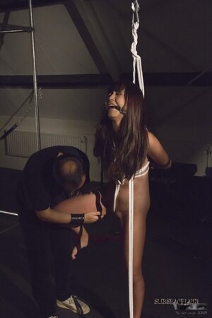 Adorable girl from Japan tied up by man who pours wax on her slim body