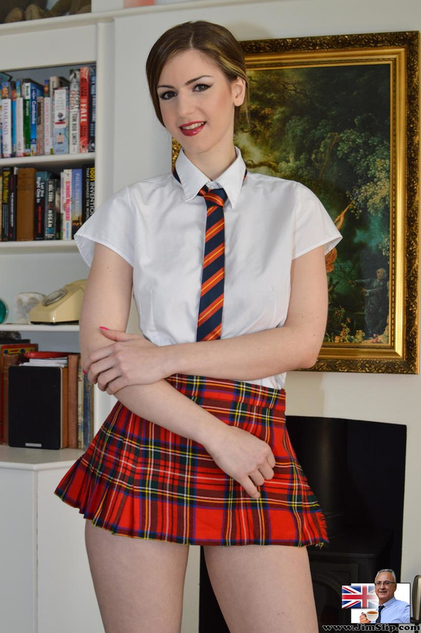 Lovely Schoolgirl With Natural Jugs Plays On Leather Sofa