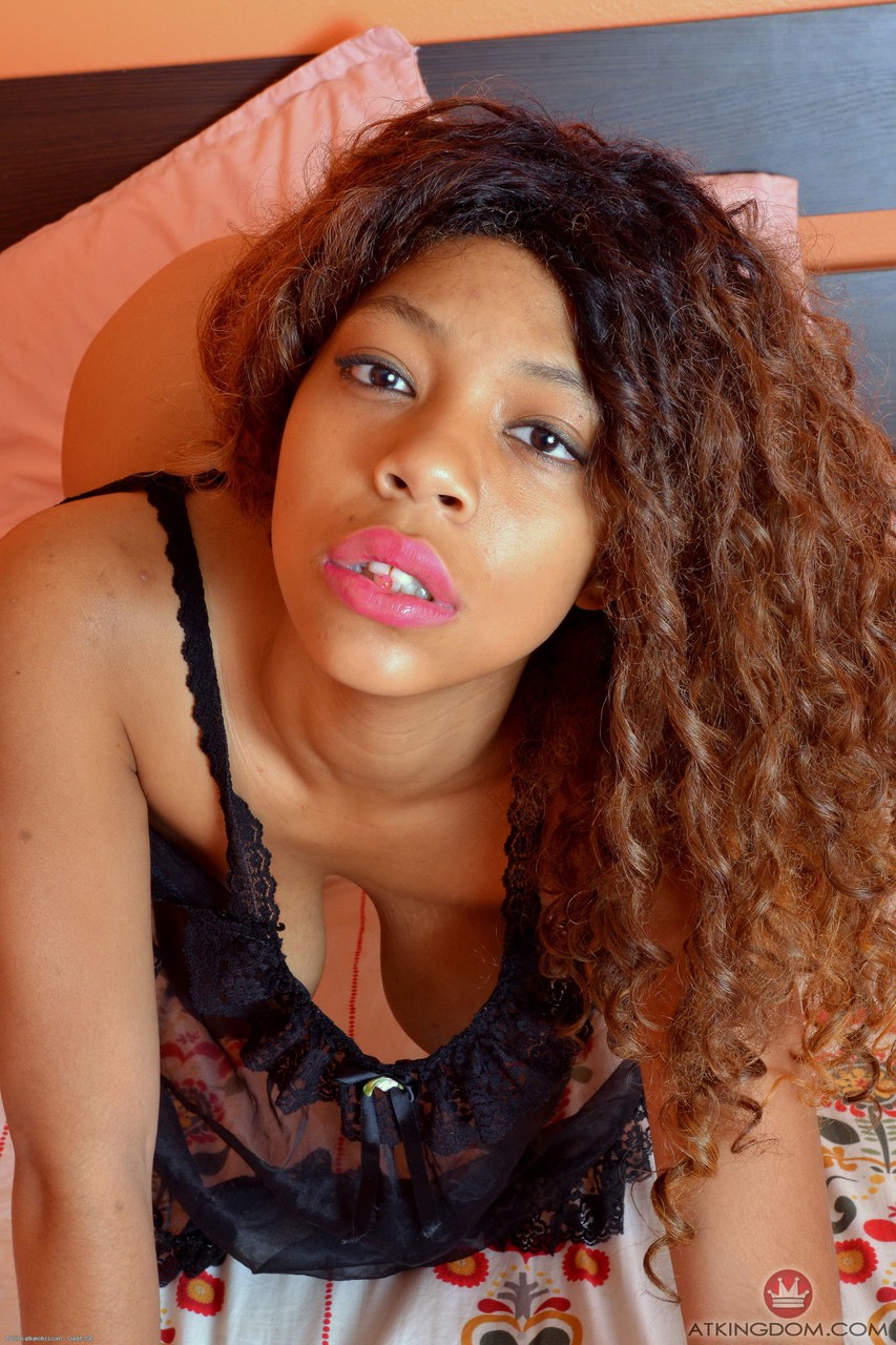 Black girl with natural tits really loves her work including posing in the nude