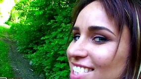 Pretty teen with blue eyes is naked and sucking dick in the forest
