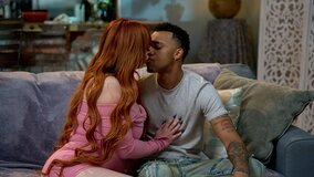 Redhead has sex wtih a black man and he cums on her pubic hair