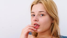 Chubby blonde teen Bianca Bell fingers her meaty pussy