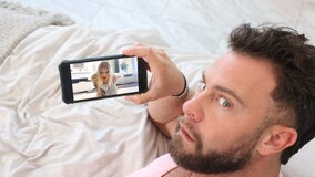 Muscle-bound hunk with a curved dick fucks tatted blonde on couch