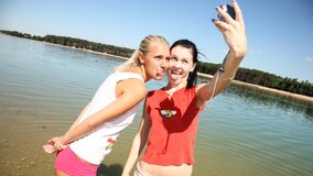Fully nude teens kiss and have lesbian sex on the beach