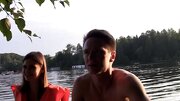 Seductive temptress is giving a blow job on the boat to a guy