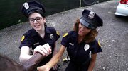 Two lady cops are having a threesome with a large black dude