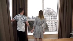 Charming girl and a horny fellow are fucking in the hotel room