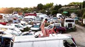Nymph in sexy lingerie screwed by stud in abandoned junkyard
