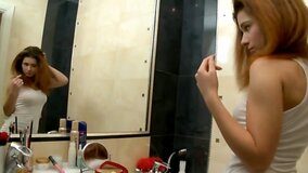 Sweet girl Kisa is playing with pussy in the bathroom