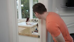 Redhead MILF blows stepson in the bathroom and gets fucked